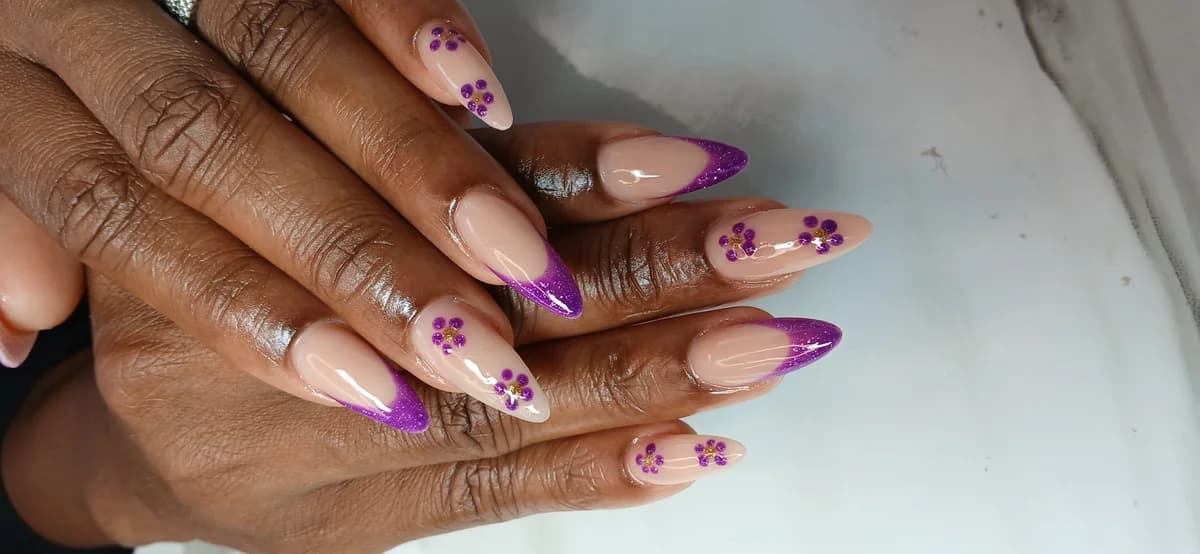 Gel X nail extensions with ombre sunset design at Glit Nails Accra