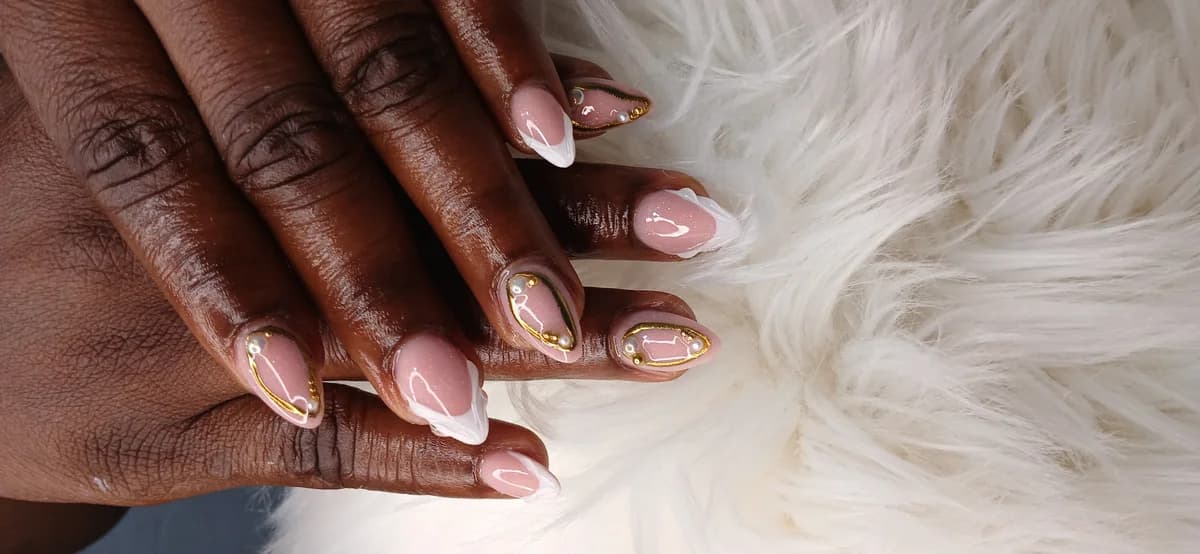 Acrylic nails with chrome powder design by Glit Nails Osu Accra