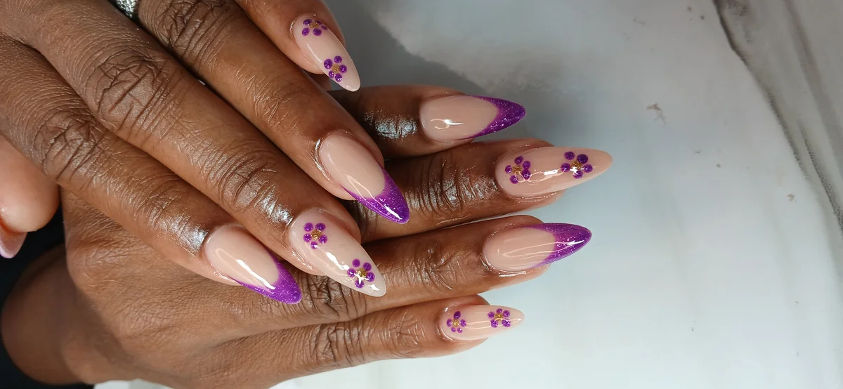 Gel X nail extensions with ombre sunset design at Glit Nails Accra
