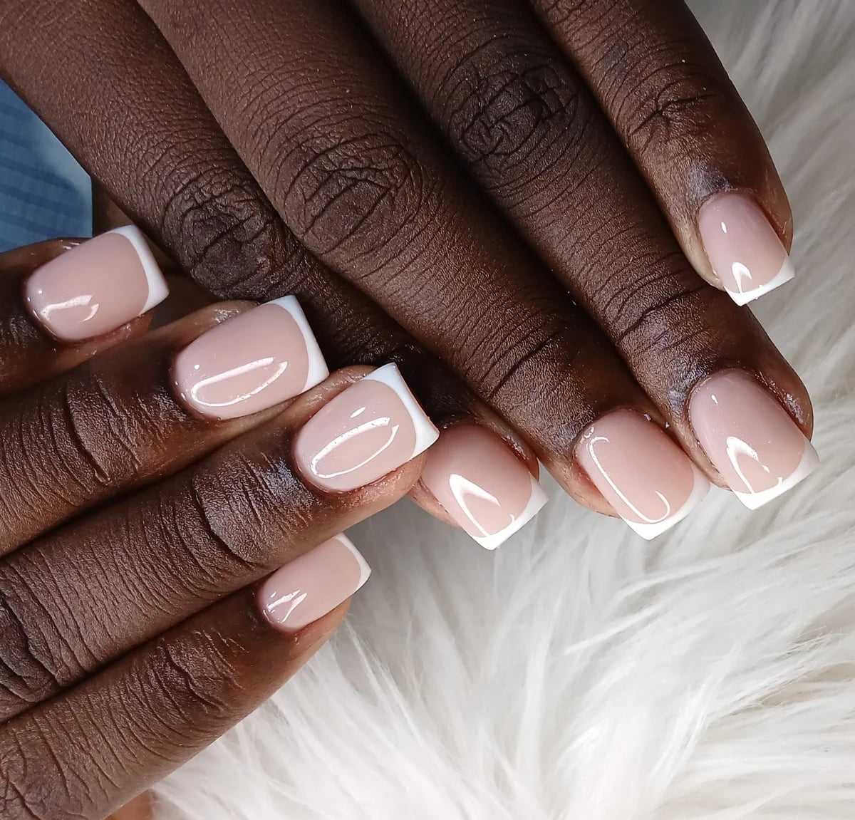 Poly Gel square nails with French tip at Glit Nails Osu Accra